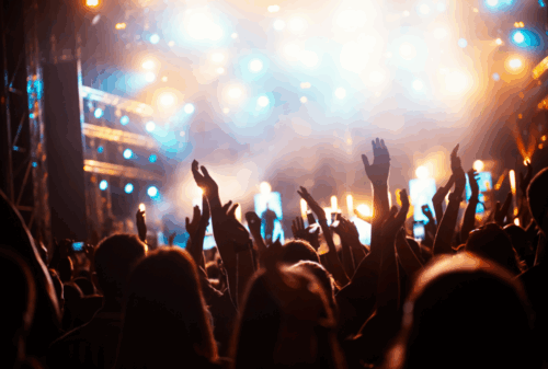 Image is of party people having fun at a outdoor concert, concept of guide to perfect summer in Nashville